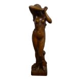 Large carved figured oak model of a diaphanously draped young woman,