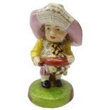 Early 19th Century Derby 'Mansion House' Dwarf wearing a broad brimmed hat,