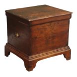 Early 19th century oak box stool with moulded hinged top on shaped bracket feet, brass handles,