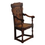 Oak Wainscot type chair, carved panel back,