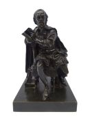 19th century patinated bronze study of William Shakespeare seated reading, square base,