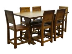 'Eagleman' rectangular oak refectory table, adzed top with solid end supports,