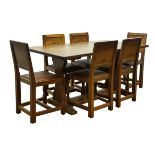 'Eagleman' rectangular oak refectory table, adzed top with solid end supports,