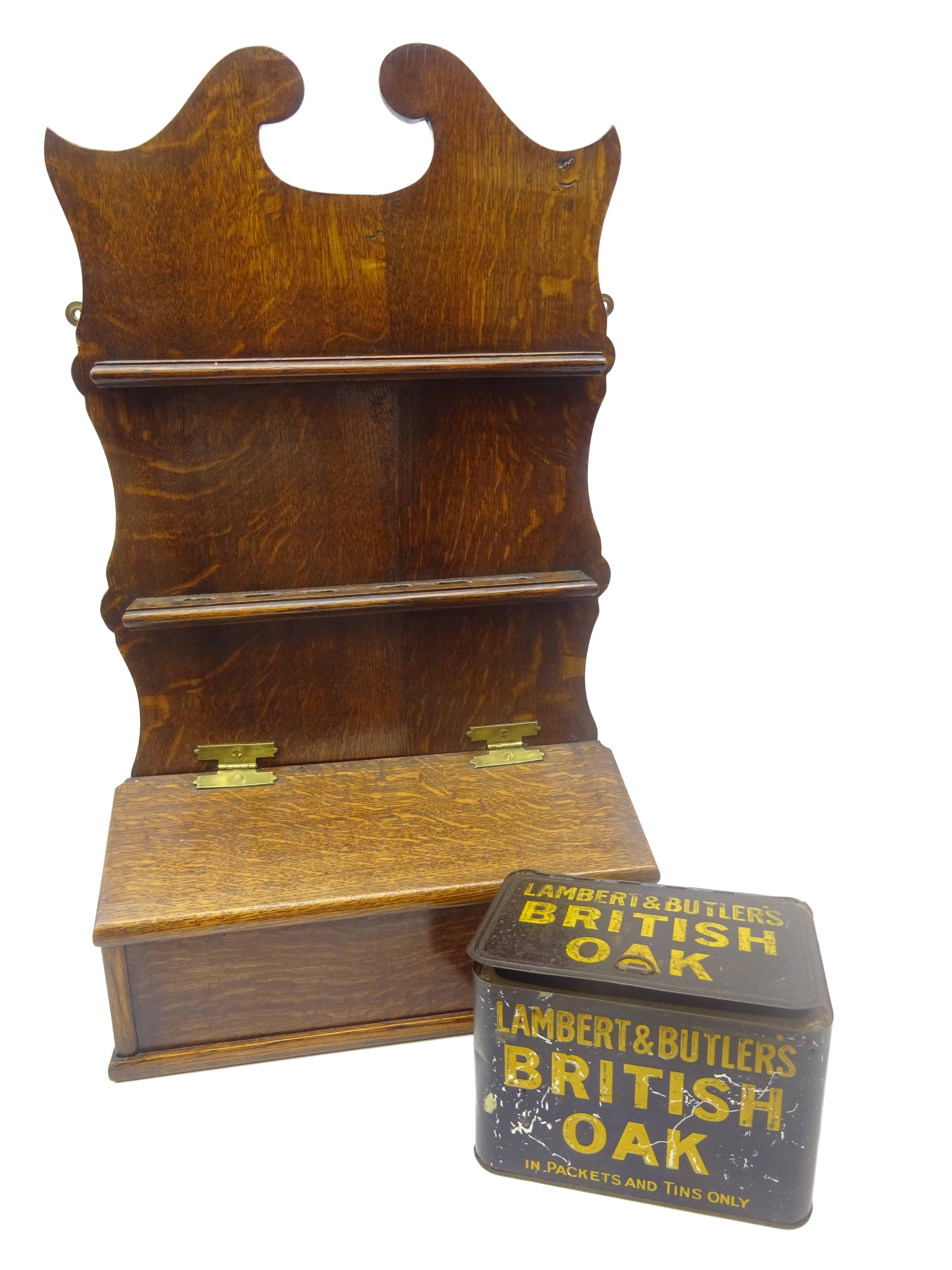 19th century oak spoon rack, shaped back with swan neck cresting and two pierced racks,