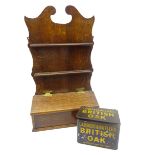 19th century oak spoon rack, shaped back with swan neck cresting and two pierced racks,