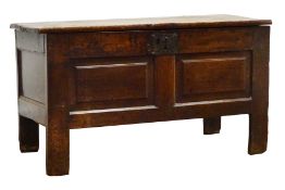 17th century oak coffer, twin planked hinged lid above fielded panelled front, on stile supports,