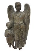 Large 19th century Continental wall mounted carving of an Angel and Child,