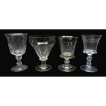 Four 19th century glass rummers, varying size and shape including a faceted example,