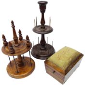 19th century mahogany two tier cotton reel stand on turned stem, circular base with four bun feet,