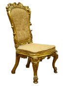 19th century carved gilt wood salon chair, shaped back with scroll work detail, serpentine seat,