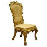 19th century carved gilt wood salon chair, shaped back with scroll work detail, serpentine seat,