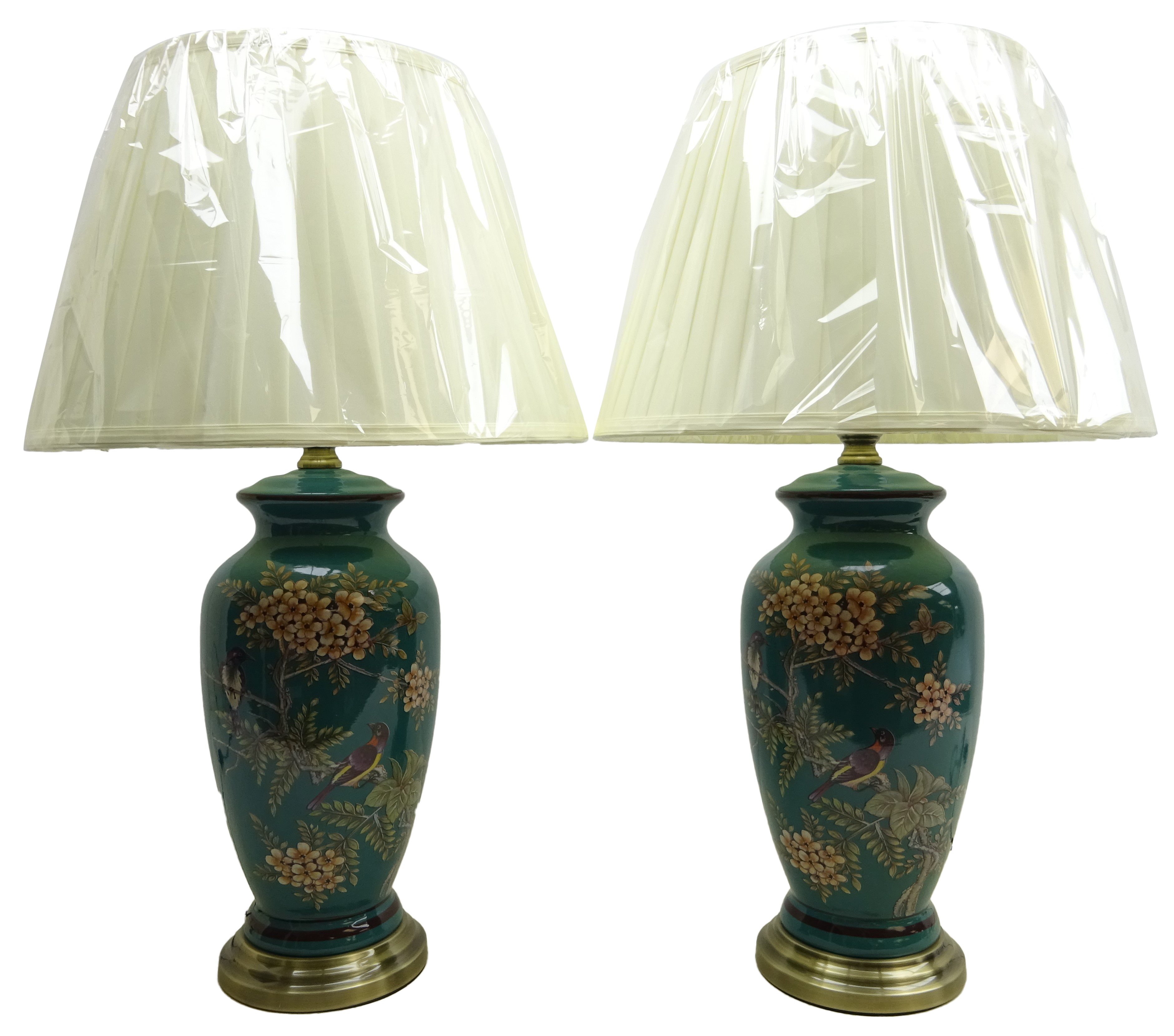 Pair Oriental style table lamps decorated with birds amongst foliage on turquoise ground,