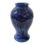 Moorcroft Cornflower pattern vase on powder blue ground, painted blue signature and impressed marks,