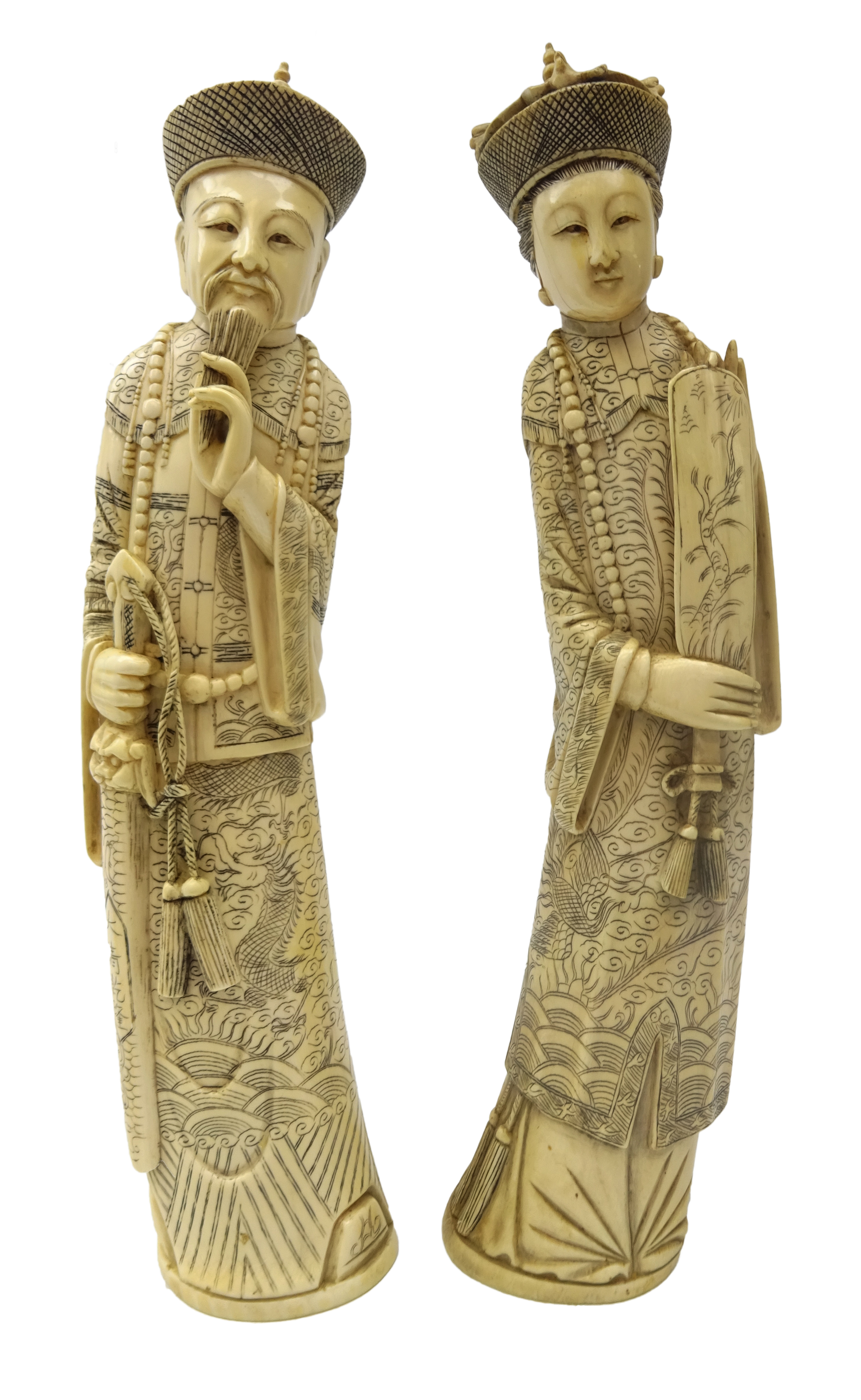 Pair 19th century Chinese carved ivory figures of an Emperor & Empress,