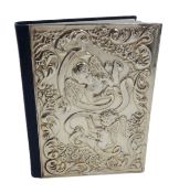 Silver fronted pocket bible embossed with cherubs by Harman Brothers, Birmingham 1990 H12.