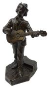 Patinated bronze study of a man singing and playing the guitar, signed D Alonzo,