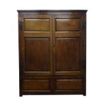 George lll oak press cupboard enclosed by a pair of twin raised and fielded panel doors,