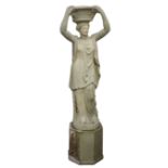 Large composite garden statue of a Roman goddess, standing supporting a flower basket,