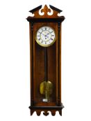 19th century Vienna walnut and ebony banded wall clock, with angular pediment,