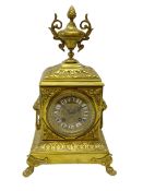 Late 19th century French gilt metal mantel clock, case with cast urn, foliage and lion mask handles,