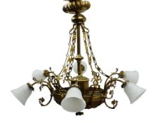 Large Regency style gilt metal electrolier, six scroll branches, foliate cast dome base,