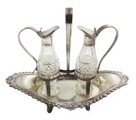 Late Victorian Adams style silver vinegar and oil stand,