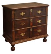 Charles II style oak chest with moulded top and three long graduated drawers on bun feet, W86cm,