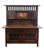 Art Nouveau stained oak sideboard, the pierced back and sides,