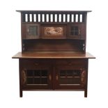 Art Nouveau stained oak sideboard, the pierced back and sides,