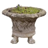 Large composite stone garden urn, bell shaped lattice moulded body with flared rim,