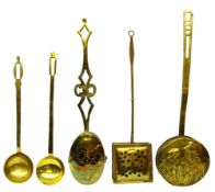 Three Victorian brass chestnut roasters and two brass cooking ladles (5) Condition Report