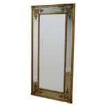 Regency style gilt framed rectangular mirror, bevelled sectional plate with bead,