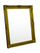 19th century overmantle mirror, upright rectangular plate in gilt wood and gesso carved frame,