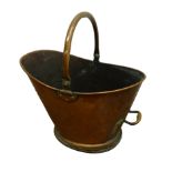 Large 19th century beaten copper coal bucket with hinged loop handle,