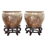 Pair of large Cantonese style Famille Rose fish bowls,