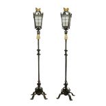 Pair wrought metal standard lamps, opaque glazed lantern tops with gilt coronet cresting,