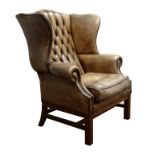 Large George lll style brass nailed leather wingback armchair,