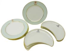 Set of six Royal Worcester Vitreous kidney shaped dishes printed with Family Crest and Motto