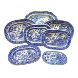 Six 19th century blue and white transfer printed Willow pattern meat plates,