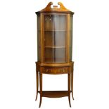 Edwardian inlaid mahogany serpentine front display cabinet,