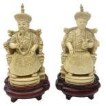 Pair 19th century Chinese ivory figures of an Emperor and Empress seated on thrones,