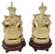 Pair 19th century Chinese ivory figures of an Emperor and Empress seated on thrones,