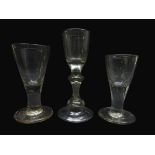 18th century drinking glasses; dram glass, ogee bowl, internal tear on folded and domed foot H13cm,