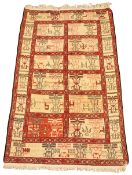 An Afghan hand woven silk rug,