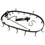 Early 20th century wrought iron Game Hanger of oblong form with fourteen hooks,