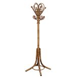 Mid 20th century bamboo hat and coat stand, scrolled top with shaped hangers, on splayed supports,