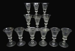 Matched set of twelve 19th century wine glasses, conical faceted bowls on knopped stems, H11.