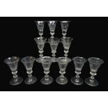 Matched set of twelve 19th century wine glasses, conical faceted bowls on knopped stems, H11.