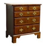 Small early 18th century walnut chest of two short and three long drawers with brass swan neck