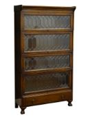 Early 20th century oak Gunn Sectional Bookcase, the four tiers with leaded glass doors,